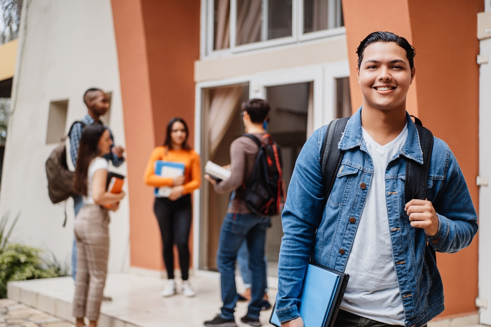 Young,Hispanic,Student,Smiling,Happy,Wearing,A,Backpack,At,The Speech Disorder Resources for College Students